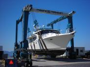 Marine Travel Lift transporting boat.